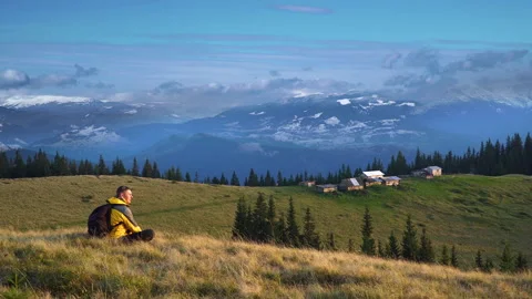 Man with a backpack in the mountains Stock Footage 142323256
