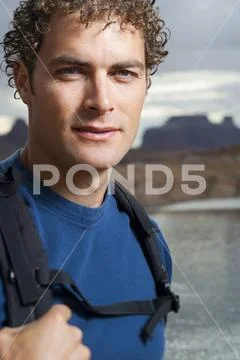 Man with backpack Stock Photos