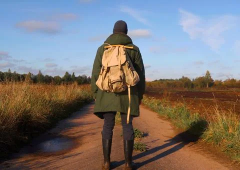 A man with a backpack on the road Foto stock