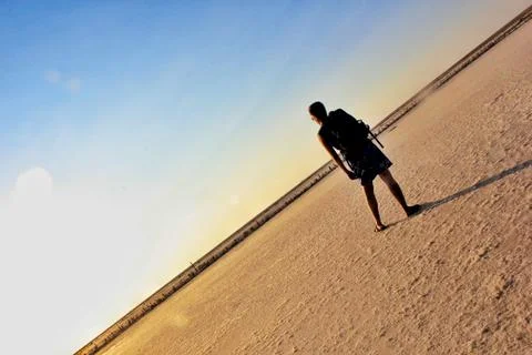 Man with backpack with skyline Stock Photos