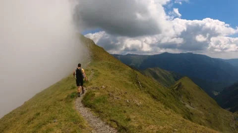 Man With Backpack Trekking Mountains Stock Footage 156904778