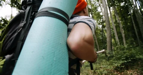 Man With Backpack Walking in Wood 動画素材 115294722