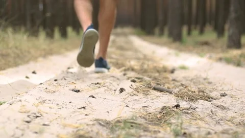 Man with backpack while hiking in the forest or mountains. Narrow focus Video stock 150260263