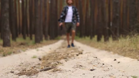 Man with backpack while hiking in the forest or mountains. Narrow focus Stock Footage 150260378