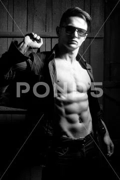 Man with bag and sun glasses Stock Photos
