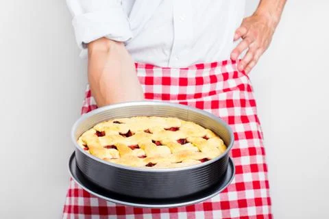 Man with baked pie Stock Photos