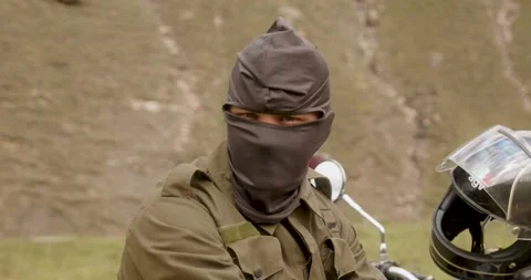 A man in a balaclava covered face Stock Footage 232137507