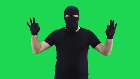 A man in a balaclava shows with two hands everything is OK,green screen Stock Footage 129434835
