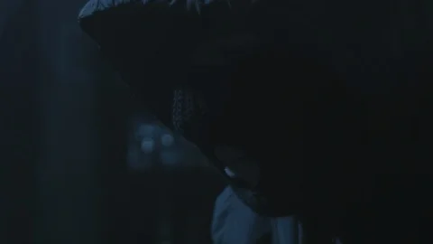 Man in balaclava thinking with cigarette Video stock 88915409