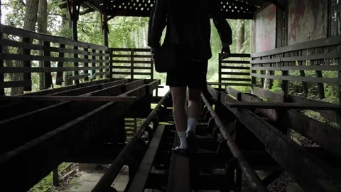 Man balancing on Abandoned Derelict Train Track Dolly Shot HD Stock Footage 128043226