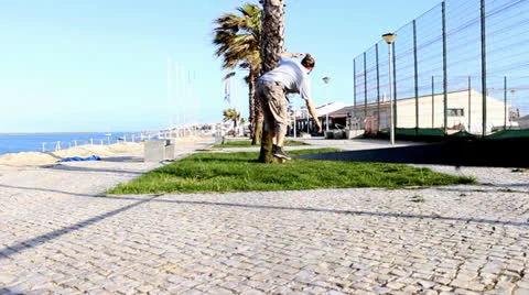Man balancing and jumping on a slackline Stock Footage 22871207