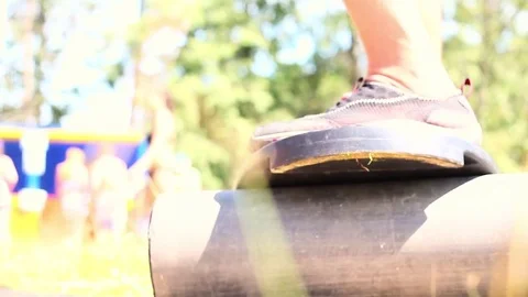 Man balancing on the Board 스톡 동영상 70003461