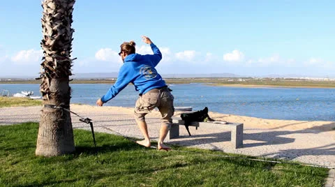 Man balancing on a slackline Video stock 22860017