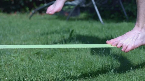 Man Balancing on Slackline Stock Footage 89530565