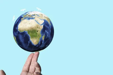 A man balancing a stylized 3D rendered illustration of planet earth with sate Stock Photos