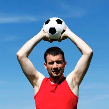 Man with ball Stock Photos