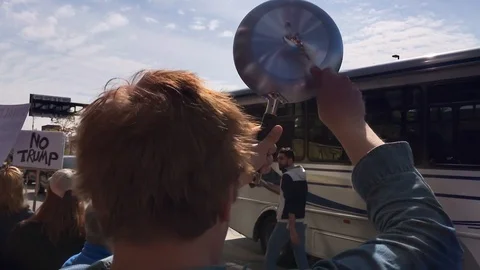 Man Bangs Pot Lid in Protest of President Trump's First Post-Election NYC Visit Stock Footage 102142397