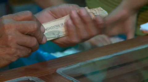 Man With Bank Notes (Sol, Peru) Stock Footage 449443