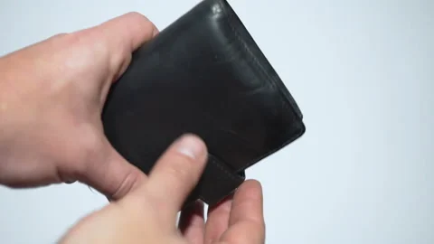 Man bankrupt arrears shows empty wallet with no money on white background Stock Footage 105277654