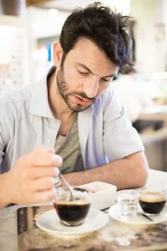 Man at the bar drinking coffee Stock Photos