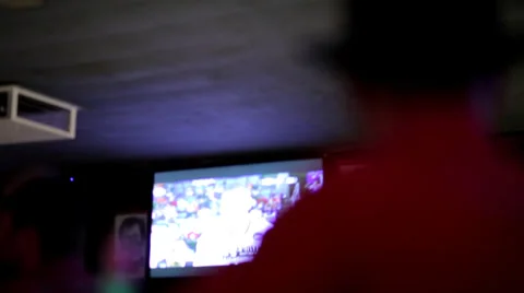 Man in Bar Watching TV Video stock 36717321