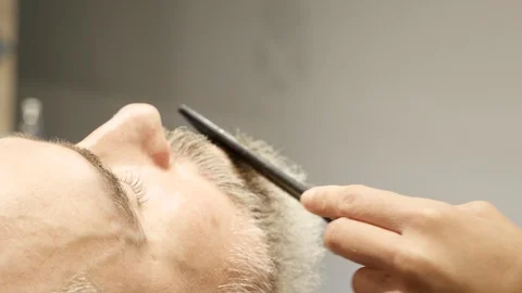 Man at barber shop Stock Footage 121122515