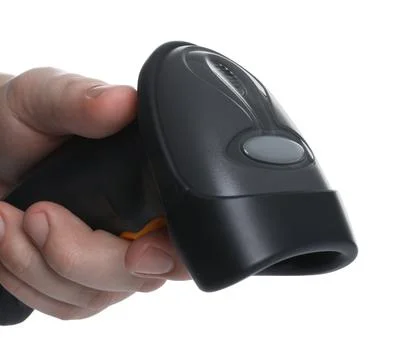 Man with barcode scanner on white background, closeup Stock-Fotos