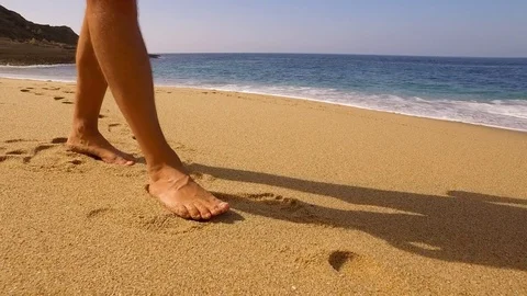 Man Bare Feet Walking Along Wave of Sea Water Stock Footage 84109993