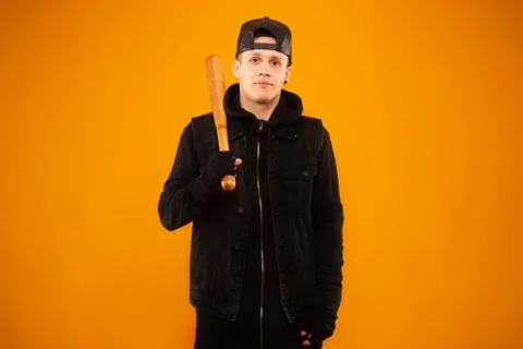 Man with bat Stock Photos