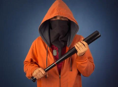 Man with bat Stock Photos