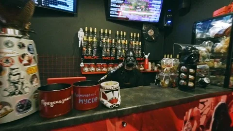 Man with bat on shoulder in cafe behind the bar Stock Footage 115699262