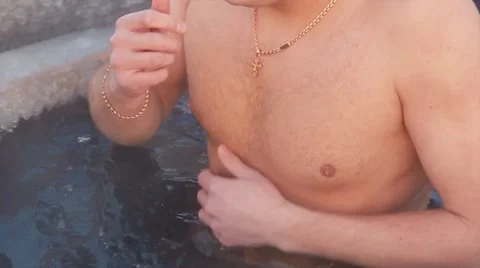 The  man bathes in an ice-hole on the Epiphany in Russia Stock Footage 59185429