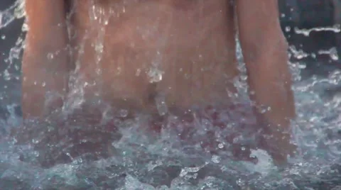 The  man bathes in an ice-hole on the Epiphany in Russia Stock Footage 59185530