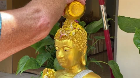 Man bathing a Buddha image during Songkran, Pattaya, Thailand 4K Stock Footage 179869839