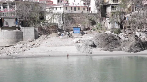 Man Bathing in Ganges River Stock Footage 41244454