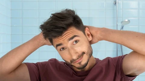 Man in bathroom Video stock 103964672