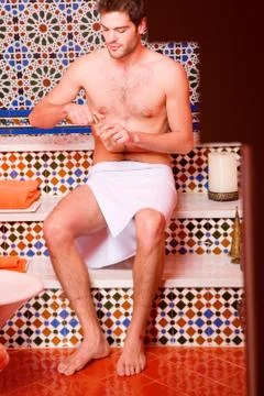 Man in the bathroom Stock Photos
