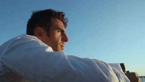 The man on the beach with binoculars Stock Footage 81017561