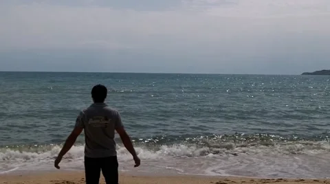 A man on the beach happy Stock Footage 50374488