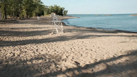 Man on beach with metal detector Stock Footage 249896393