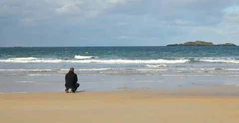 Man at the beach 库存照片
