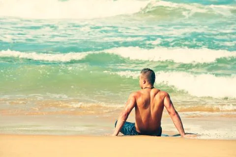 Man on the beach Stock Photos