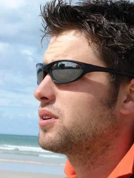 Man on beach Stock Photos