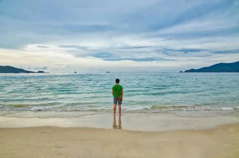 Man on the beach Stock Photos