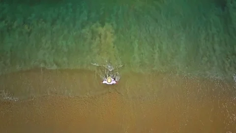 Man on the beach, top view Stock Footage 77343599