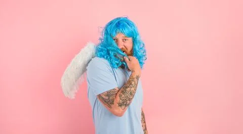 Man with beard and blue peruke acts like an agel with wings Stock Photos