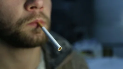 Man with beard and mustache Smoking a cigarette Stock Footage 85575075