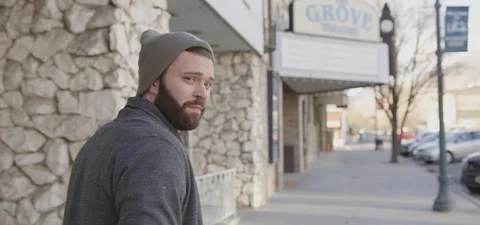 Man with Beard in Beanie Looking Back Stock Footage 87103059