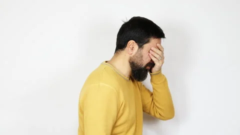 Man with beard closing eyes with hand showing stop gesture. Stock Footage 165807342
