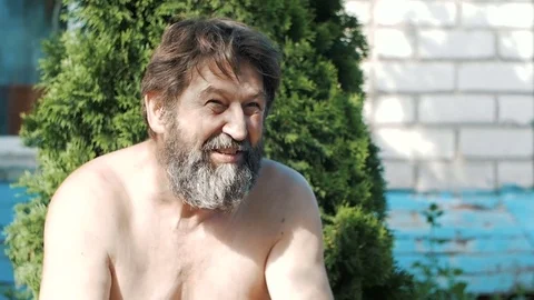 Man with a beard communicates emotionally Stock Footage 82949511